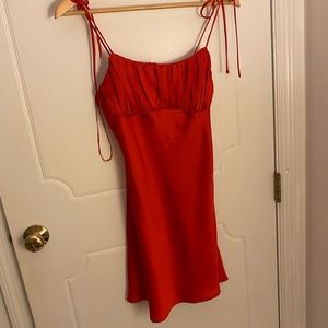 Fun red dress! The tie straps make it very easily adjustable!
